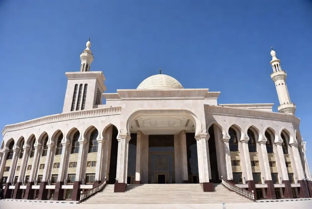 Grand mosque with a central dome and minarets in Iraq